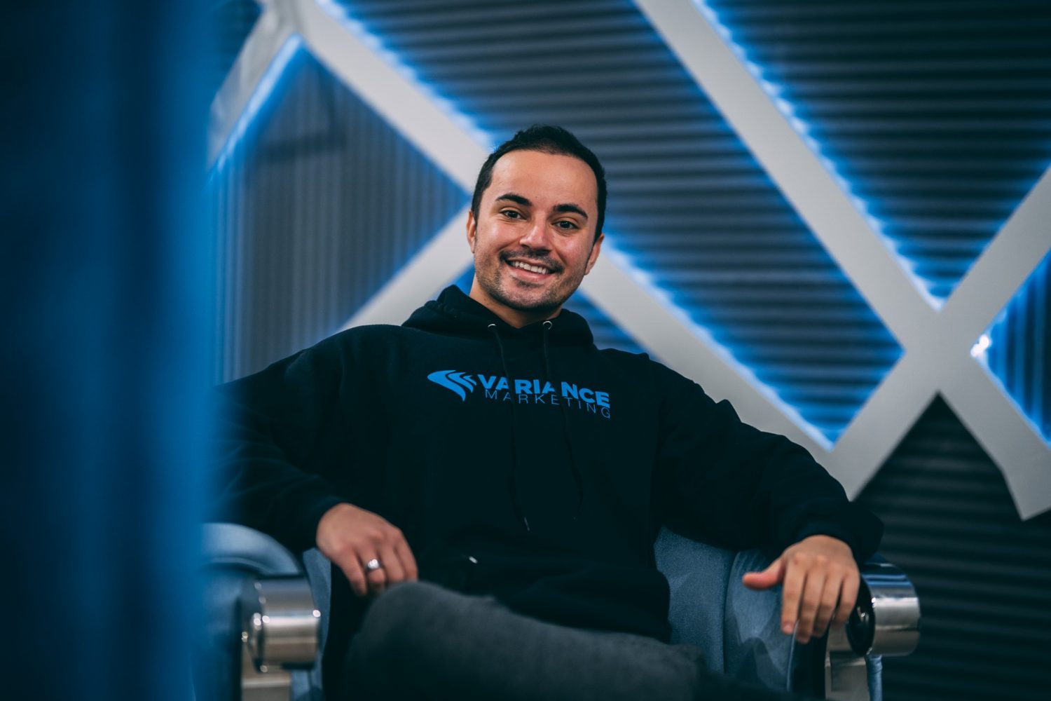 A Variance Marketing team member in a company hoodie
